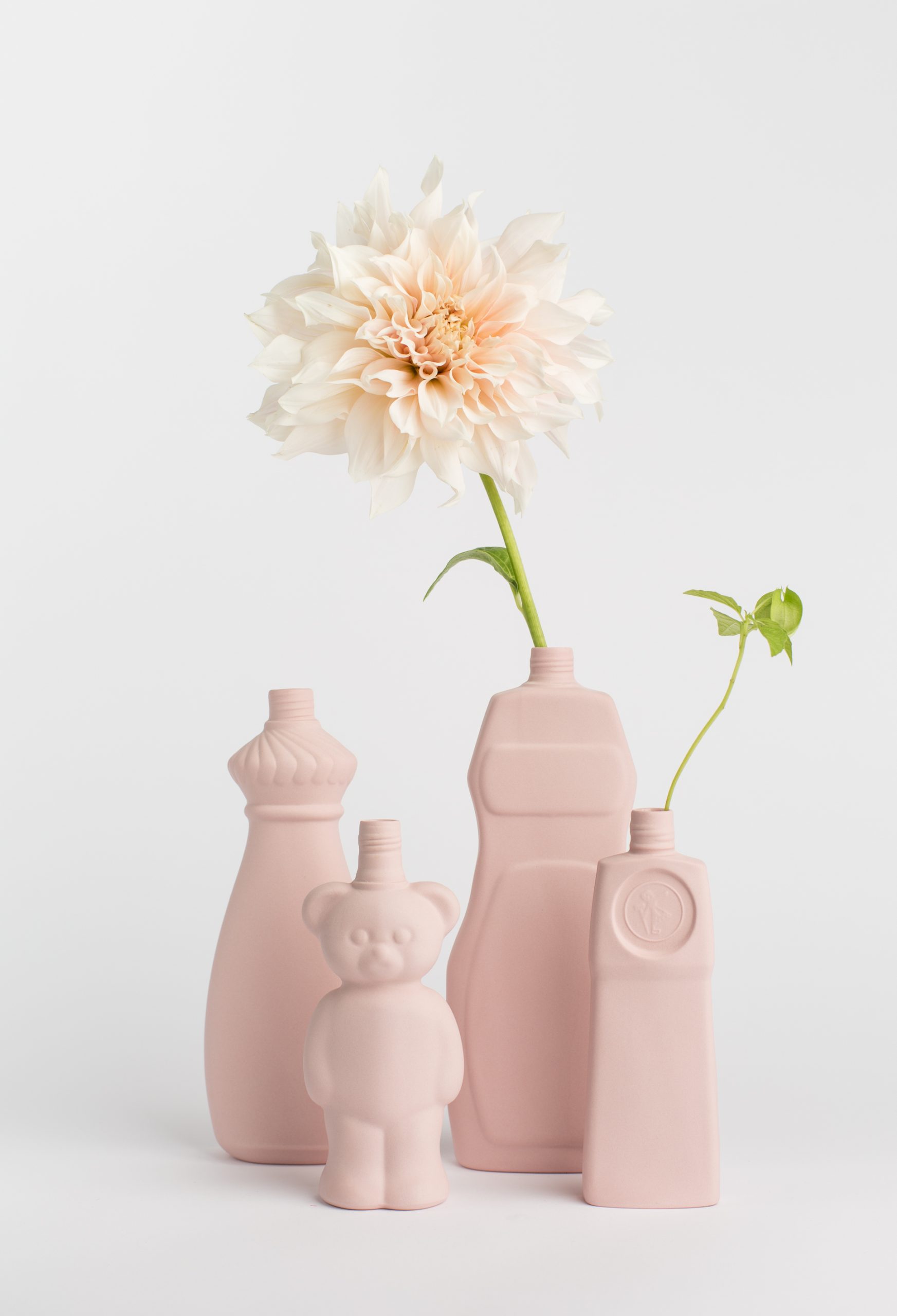 group photo in pink vases